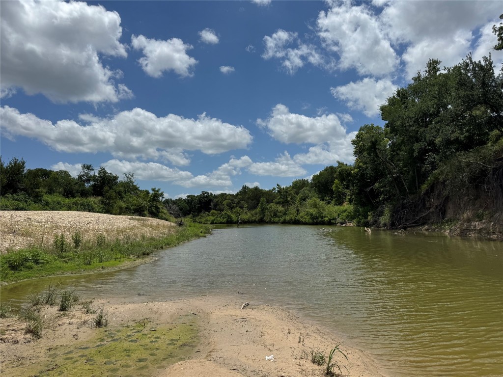 2371 County Road 2371 Road Meridian, TX 76665 - Photo 5 of 34 a view of a lake from a yard