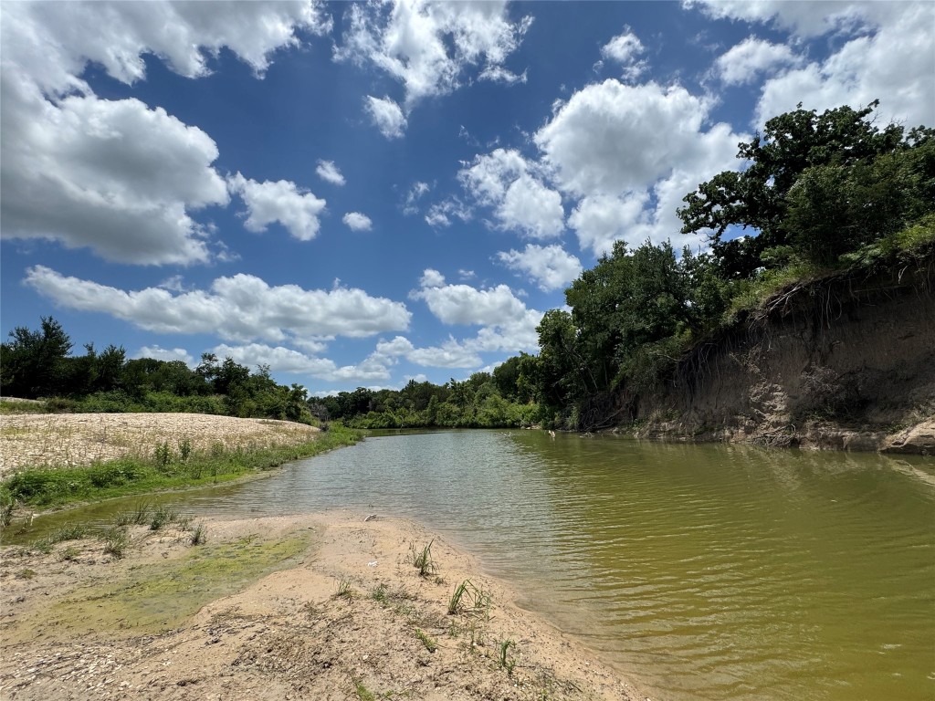 2371 County Road 2371 Road Meridian, TX 76665 - Photo 8 of 34 a view of a lake from a yard