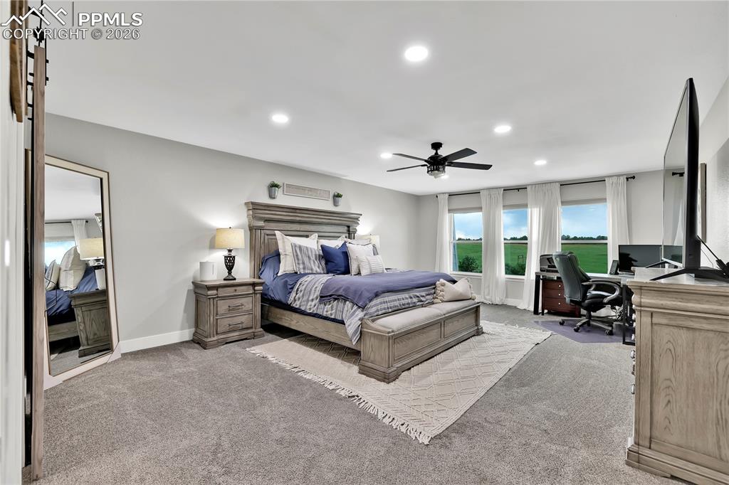 18135 Spur Ranch Road Peyton, CO 80831 - Photo 17 of 50 Main bedroom features incredible views and a large space.