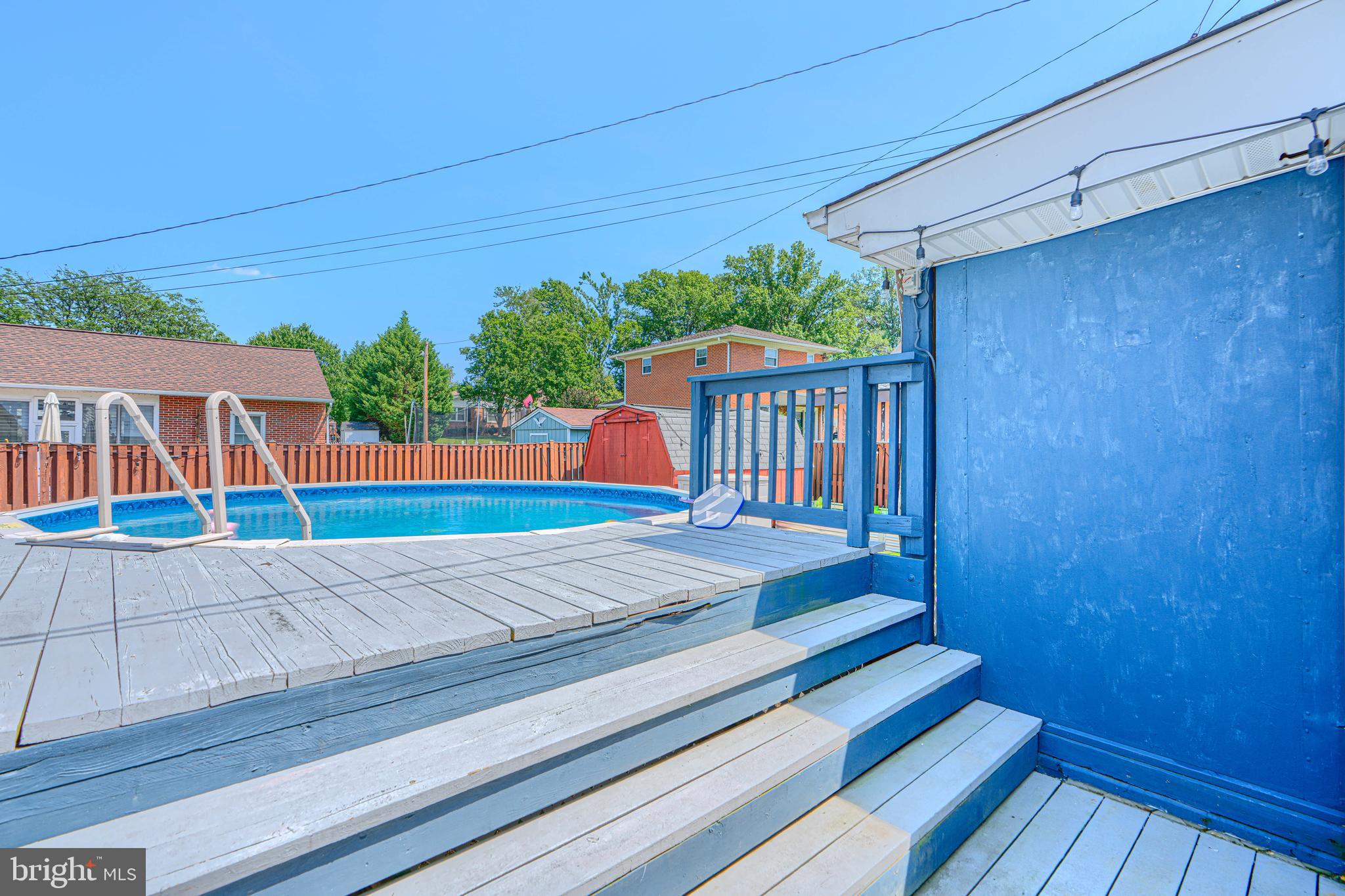 559 Fairmount Road Linthicum Heights, MD 21090 - Photo 47 of 58 above ground pool with decking and fence