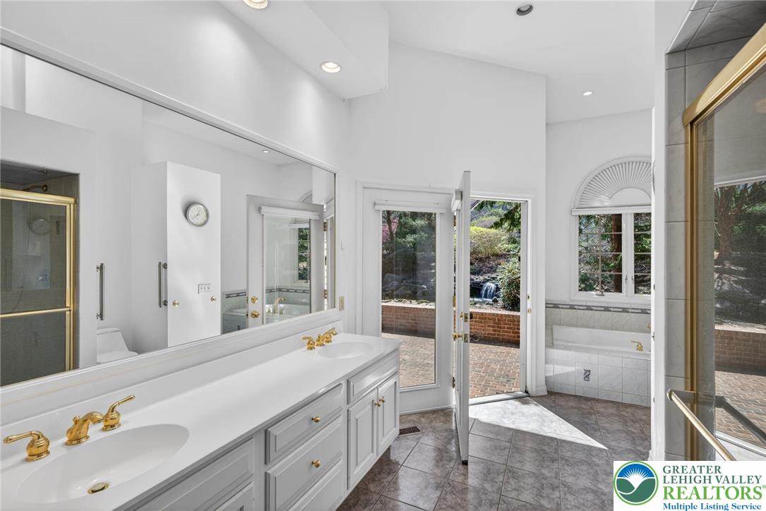 3190 Sheffield Drive Emmaus, PA 18049 - Photo 23 of 43 a spacious bathroom with a tub and shower