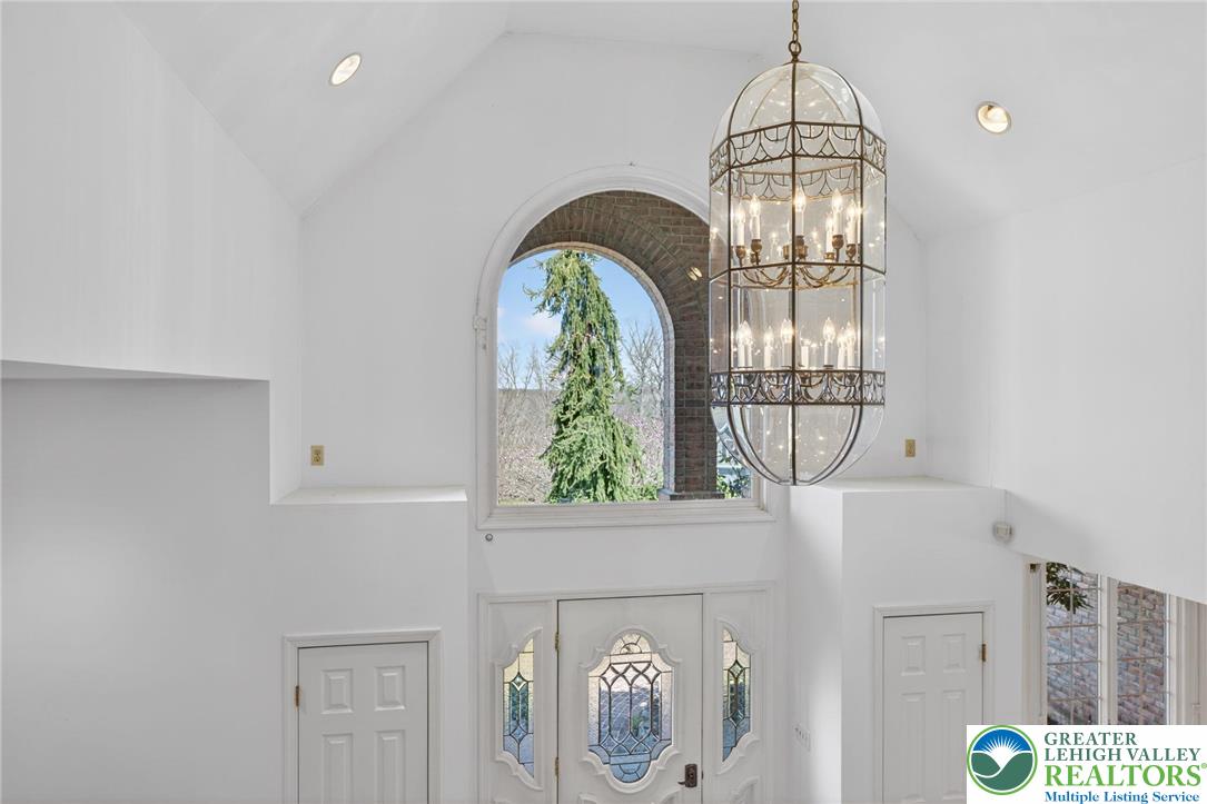 3190 Sheffield Drive Emmaus, PA 18049 - Photo 27 of 43 a front view of a room with a chandelier and a rug