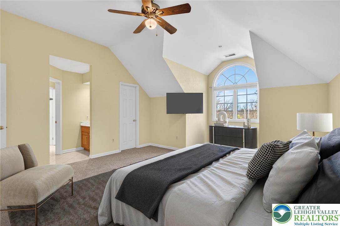 3190 Sheffield Drive Emmaus, PA 18049 - Photo 28 of 43 a bedroom with a bed couch and window