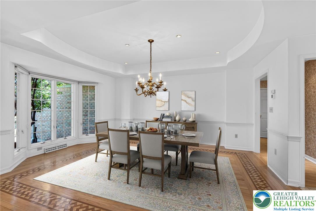3190 Sheffield Drive Emmaus, PA 18049 - Photo 7 of 43 a view of a dining room with furniture window and wooden floor
