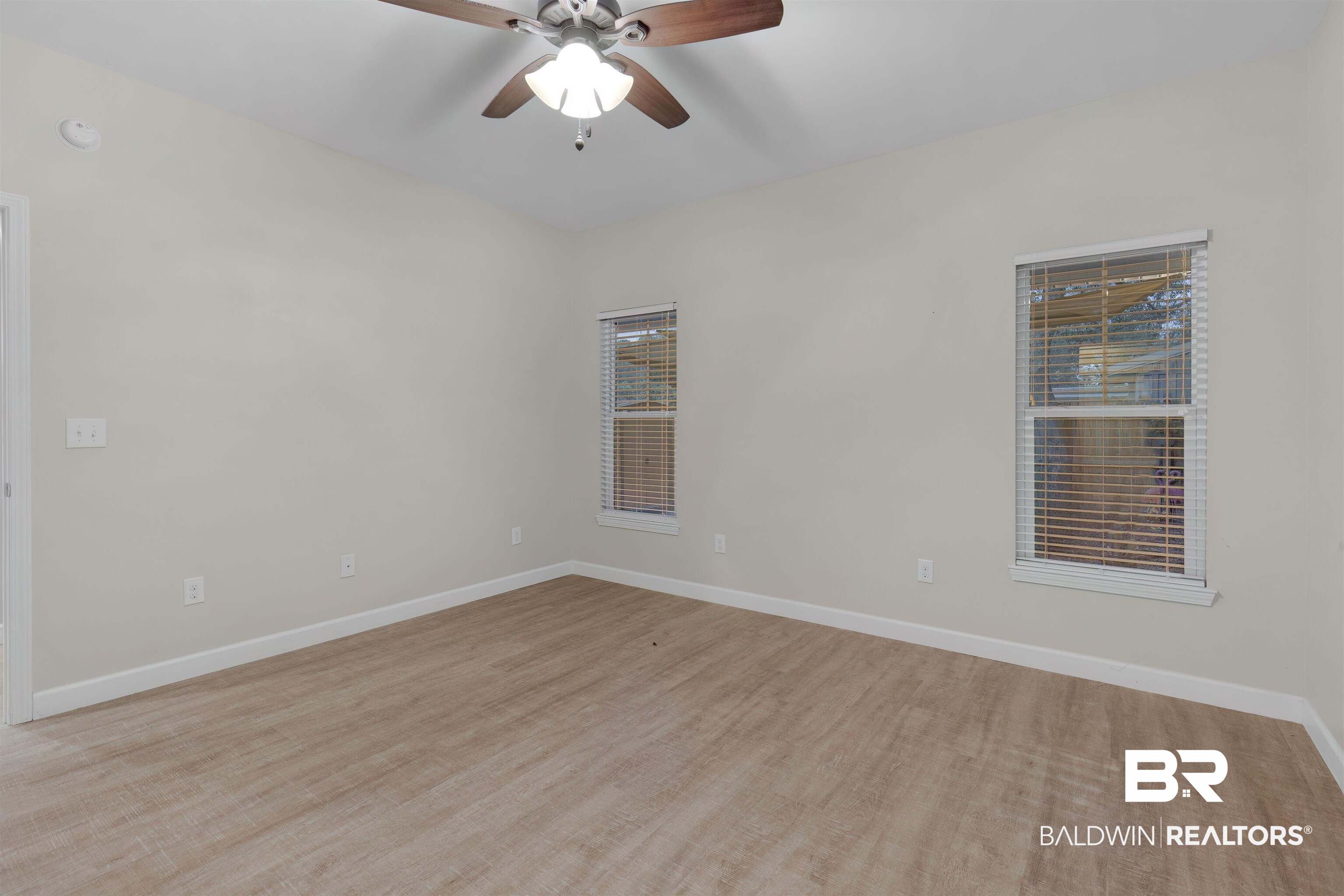 5625 Georgia Street Orange Beach, AL 36561 - Photo 16 of 30 Spare room with ceiling fan and light hardwood / wood-style flooring