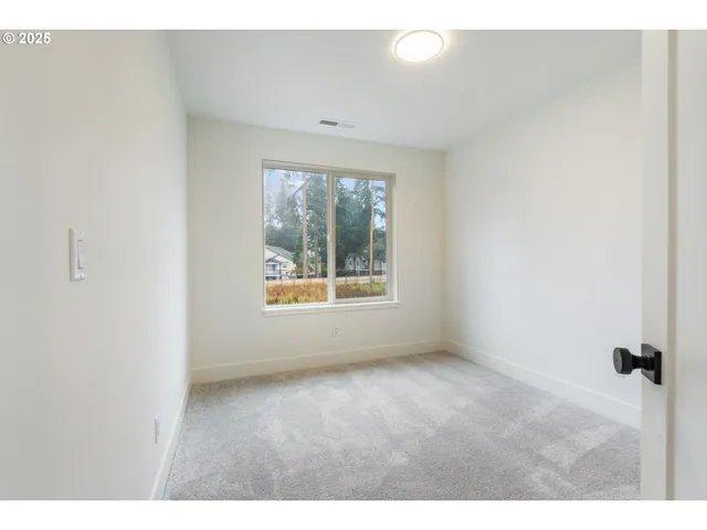 a view of an empty room with window