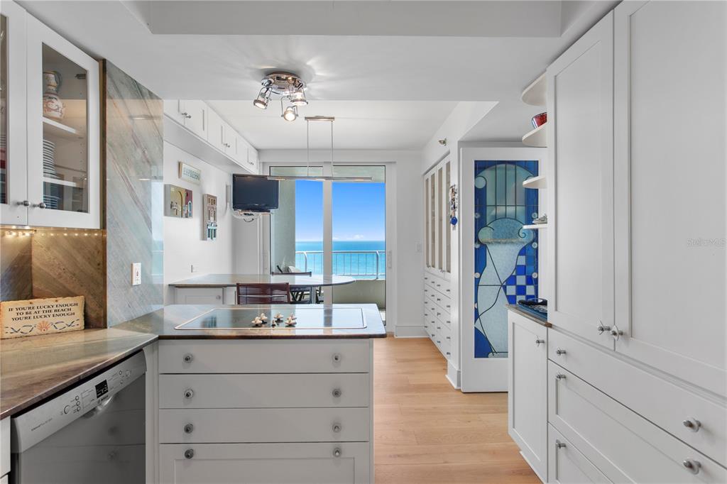 775 Longboat Club Road, Unit 808 Longboat Key, FL 34228 - Photo 14 of 41 a spacious bathroom with a granite countertop double vanity sink mirror and bathtub