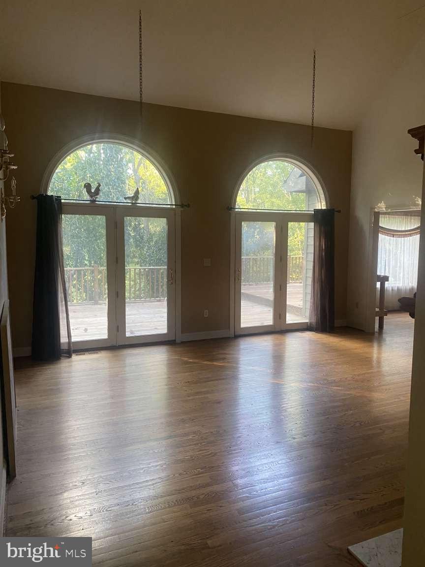 44 Frederick Way Kirkwood, PA 17536 - Photo 11 of 50 an empty room with wooden floor and windows