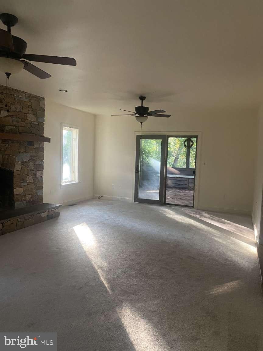 44 Frederick Way Kirkwood, PA 17536 - Photo 14 of 50 a view of an empty room with a fireplace