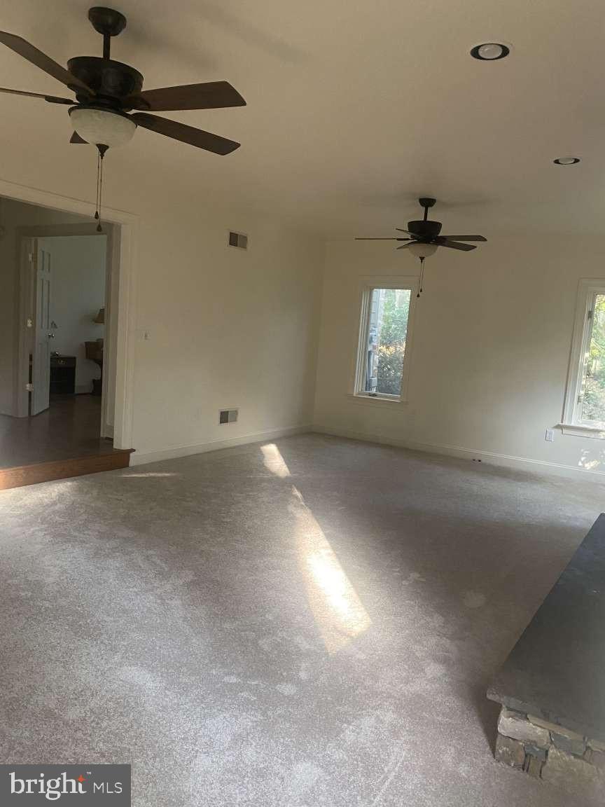 44 Frederick Way Kirkwood, PA 17536 - Photo 15 of 50 an empty room with windows and fan