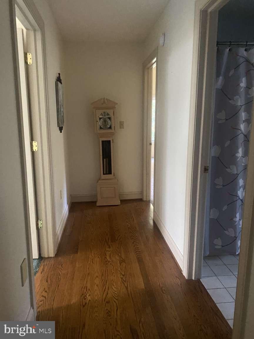 44 Frederick Way Kirkwood, PA 17536 - Photo 26 of 50 a view of a hallway with wooden floor and a bathroom
