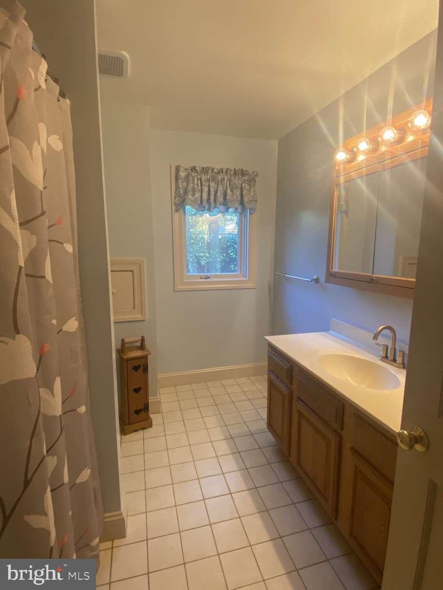 44 Frederick Way Kirkwood, PA 17536 - Photo 28 of 50 a bathroom with a sink and a mirror