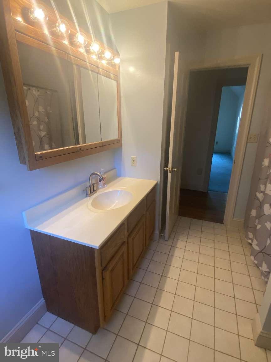 44 Frederick Way Kirkwood, PA 17536 - Photo 30 of 50 a bathroom with a sink vanity and mirror