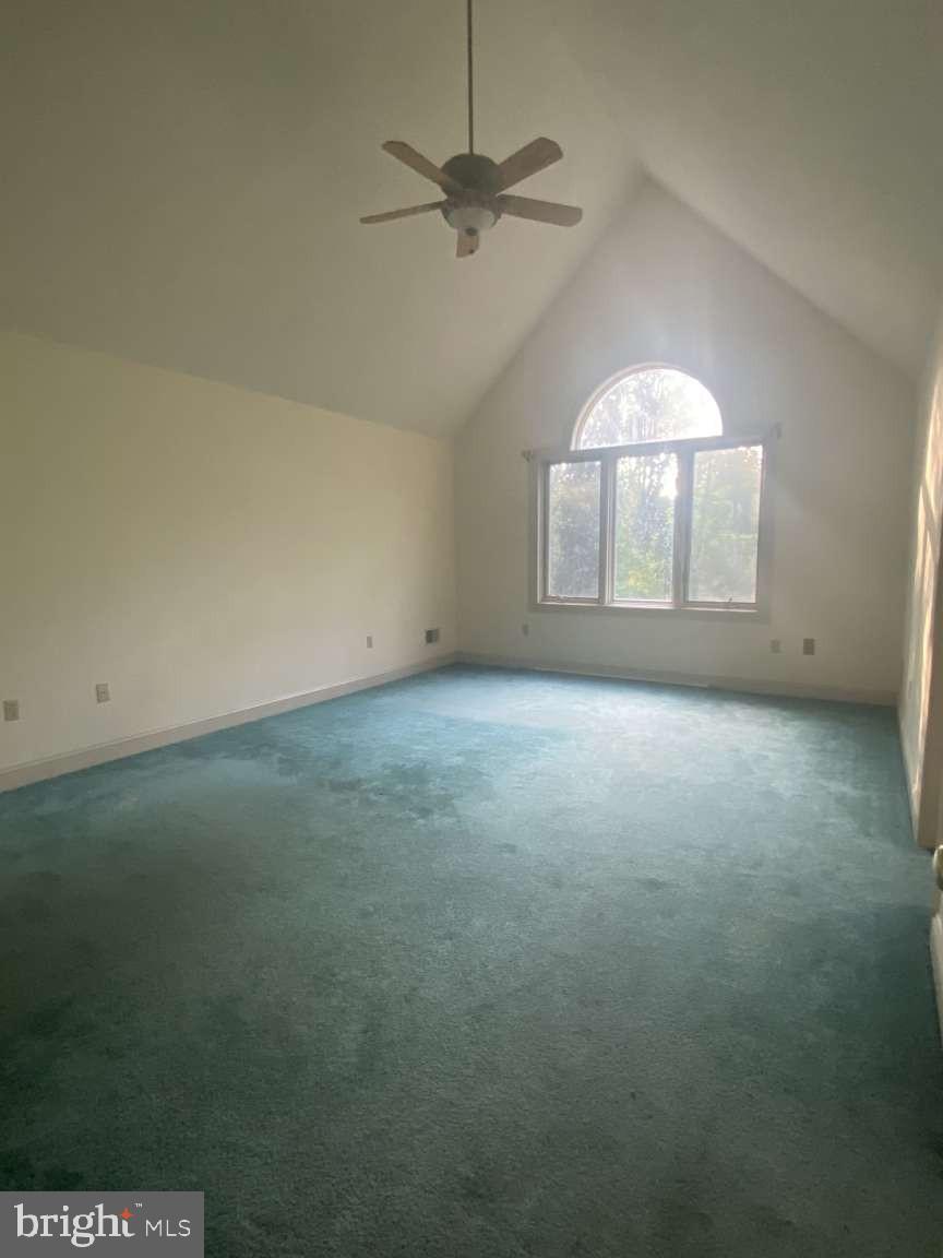 44 Frederick Way Kirkwood, PA 17536 - Photo 31 of 50 an empty room with a chandelier fan and windows