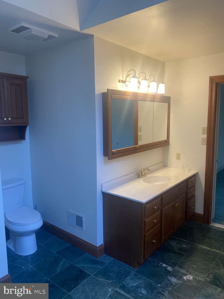 44 Frederick Way Kirkwood, PA 17536 - Photo 37 of 50 a bathroom with a sink and a mirror