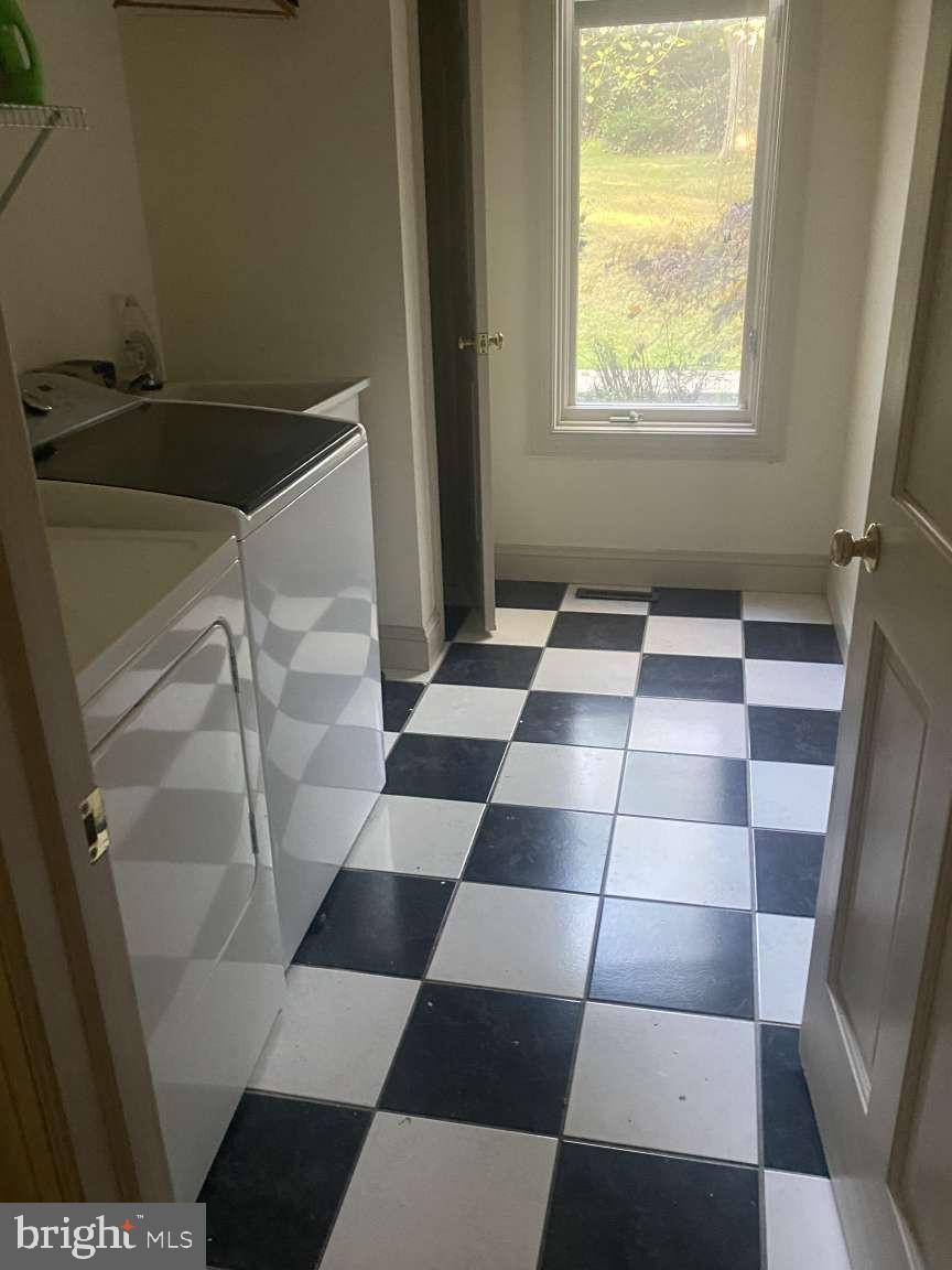 44 Frederick Way Kirkwood, PA 17536 - Photo 43 of 50 a black and white checkered floor