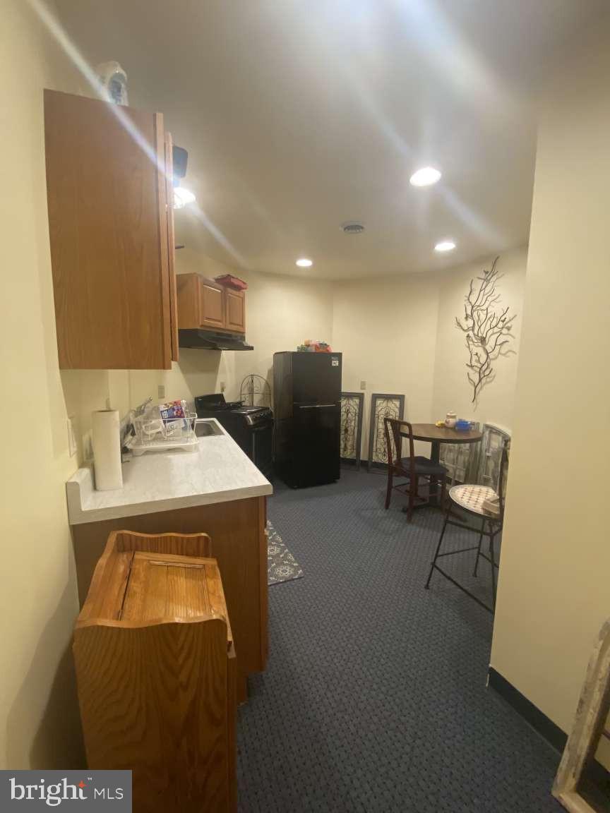 44 Frederick Way Kirkwood, PA 17536 - Photo 49 of 50 a kitchen with a sink and chairs