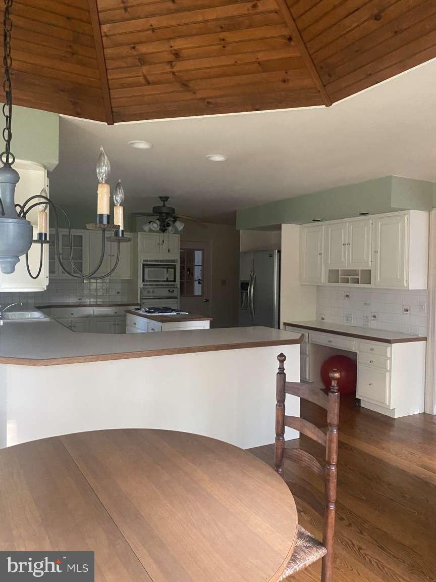 44 Frederick Way Kirkwood, PA 17536 - Photo 8 of 50 a kitchen with stainless steel appliances granite countertop a sink and cabinets