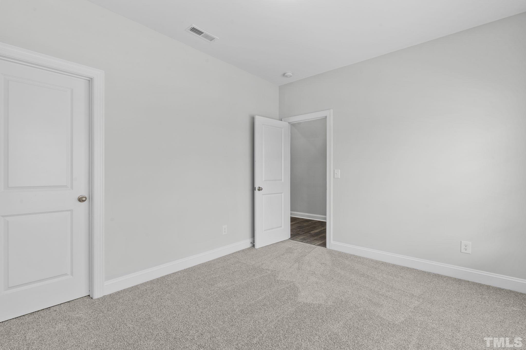 1150 Breadsell Lane Wake Forest, NC 27587 - Photo 16 of 33 a view of an empty room