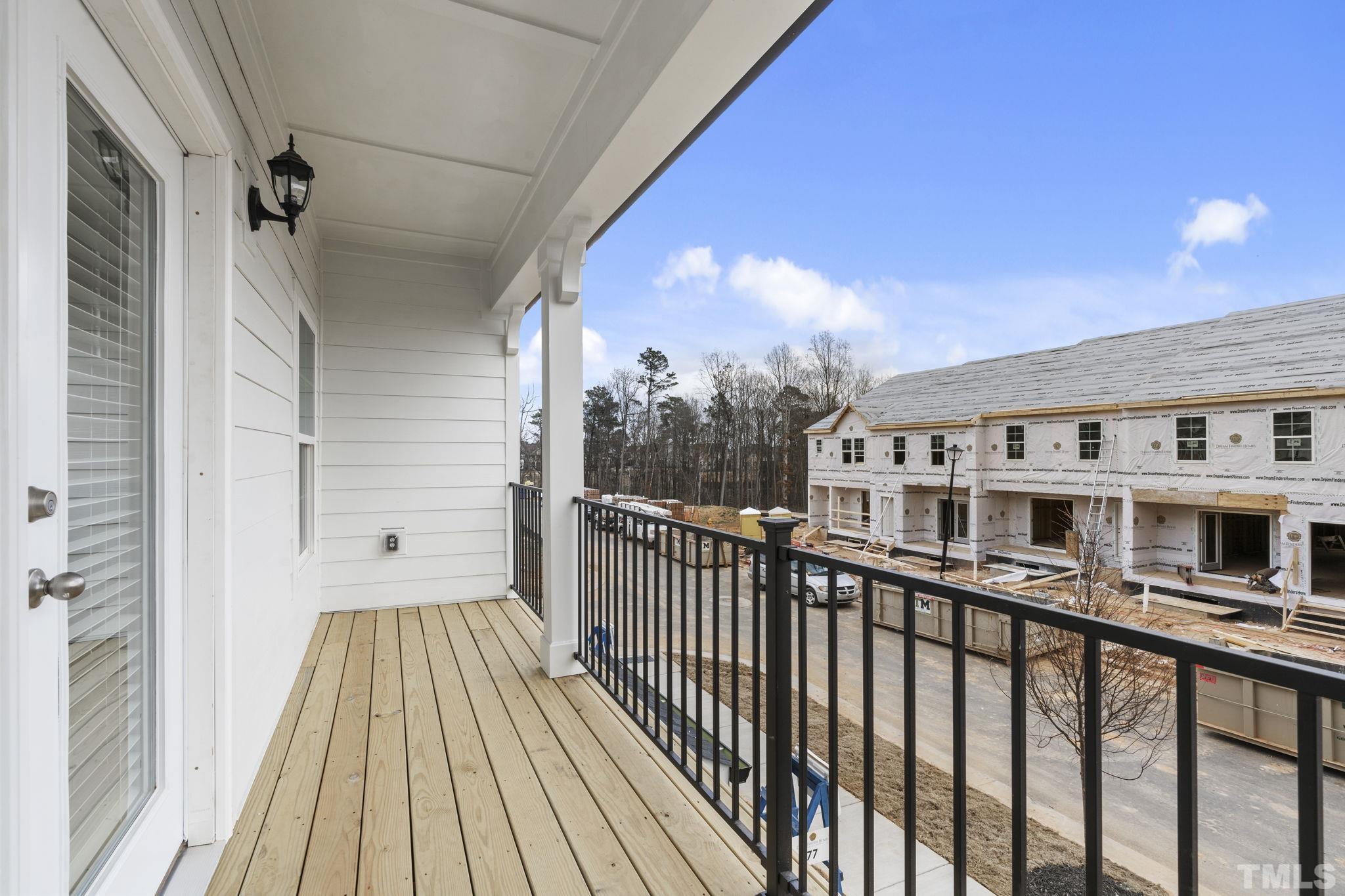 1150 Breadsell Lane Wake Forest, NC 27587 - Photo 27 of 33 a view of a large building with a balcony