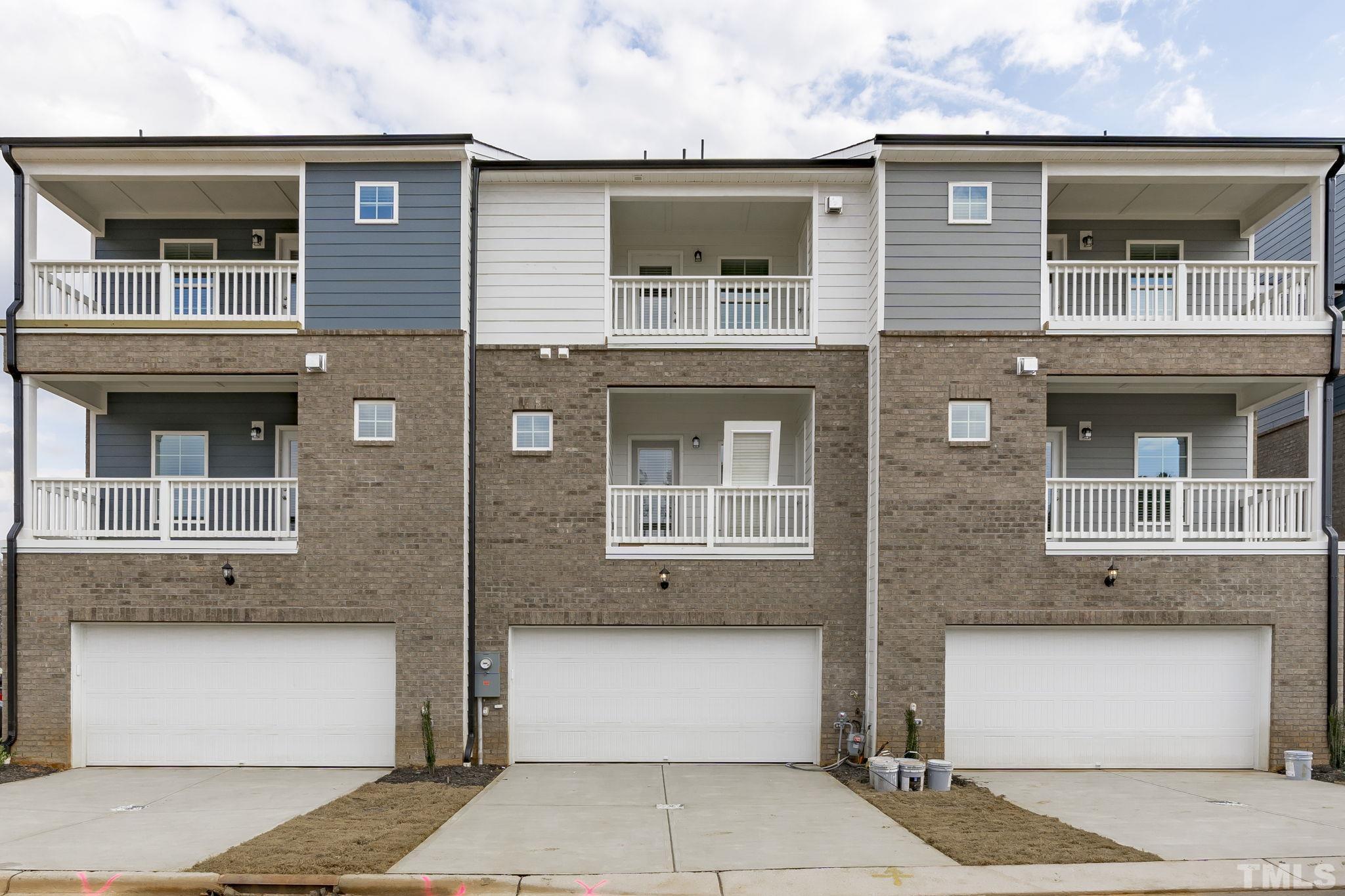 1150 Breadsell Lane Wake Forest, NC 27587 - Photo 30 of 33 a front view of a house with a garage