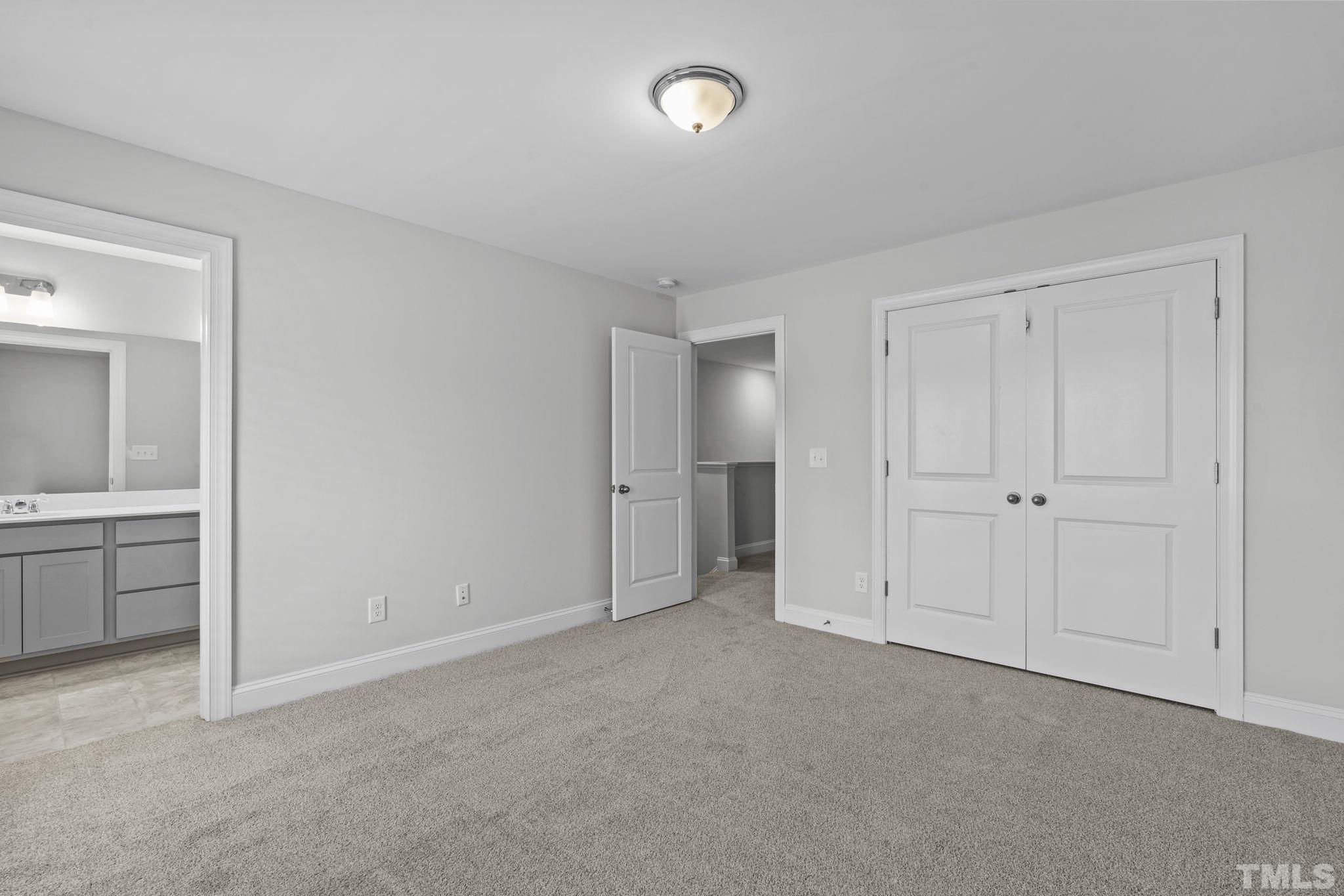 1150 Breadsell Lane Wake Forest, NC 27587 - Photo 10 of 33 a view of an empty room and a bathroom