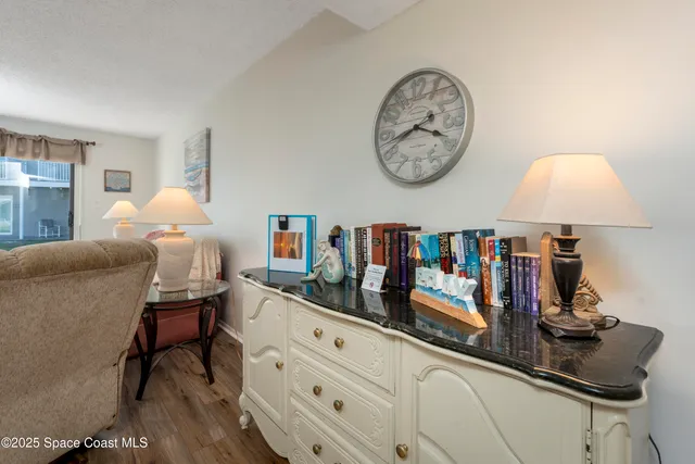 a bed room with a bed and a lamp