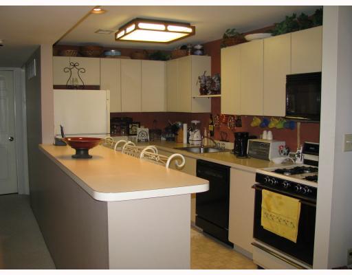 2412 Kenzie Road Pittsburgh, PA 15205 - Photo 6 of 9 Kitchen. The fully equipped kitchen will meet all of your cooking needs. A breakfast bar equipped with stools provides a stop for those quick meals.