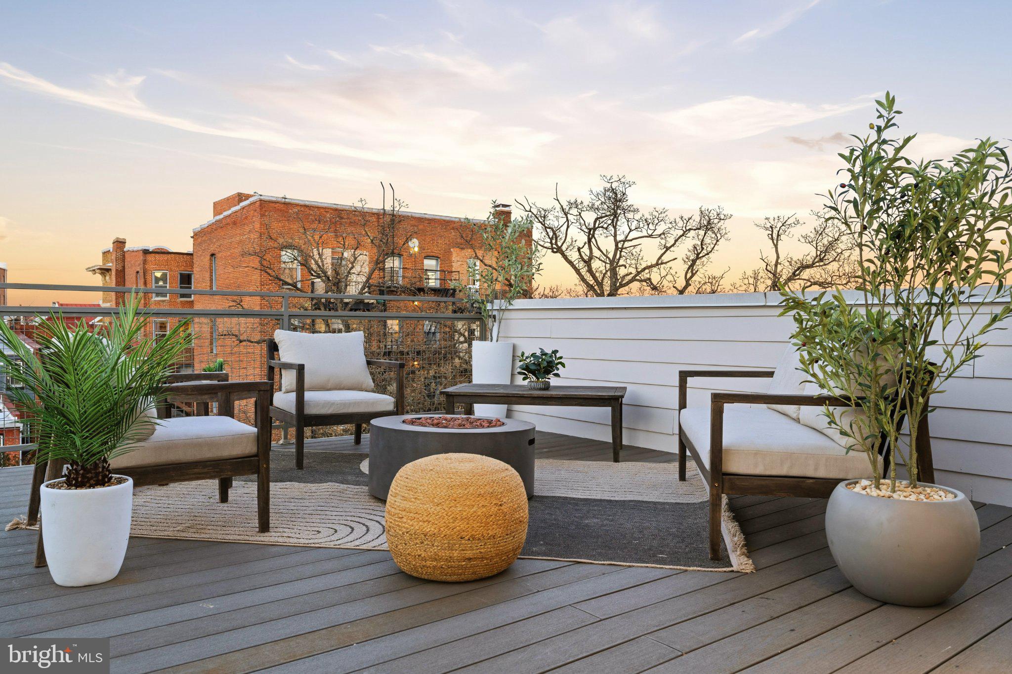 1837 Kalorama Road Northwest, Unit F Washington, DC 20009 - Photo 35 of 42 Charming rooftop retreat at sunset.