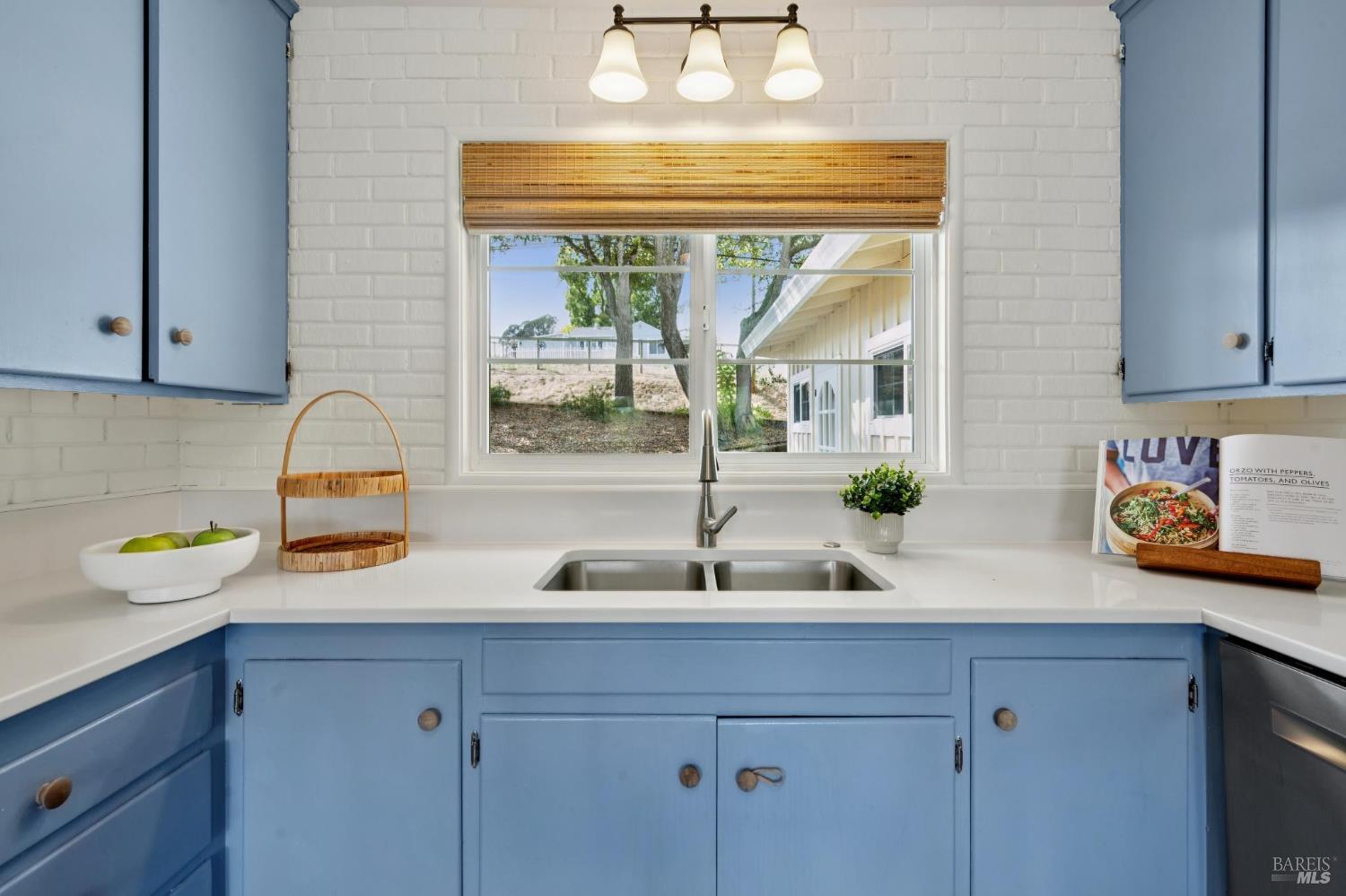 447 Sparkes Road Sebastopol, CA 95472 - Photo 14 of 44 a kitchen with a sink and a window