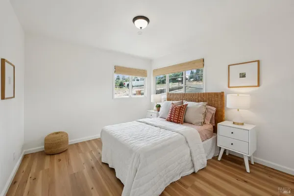 a bedroom with a bed and a closet