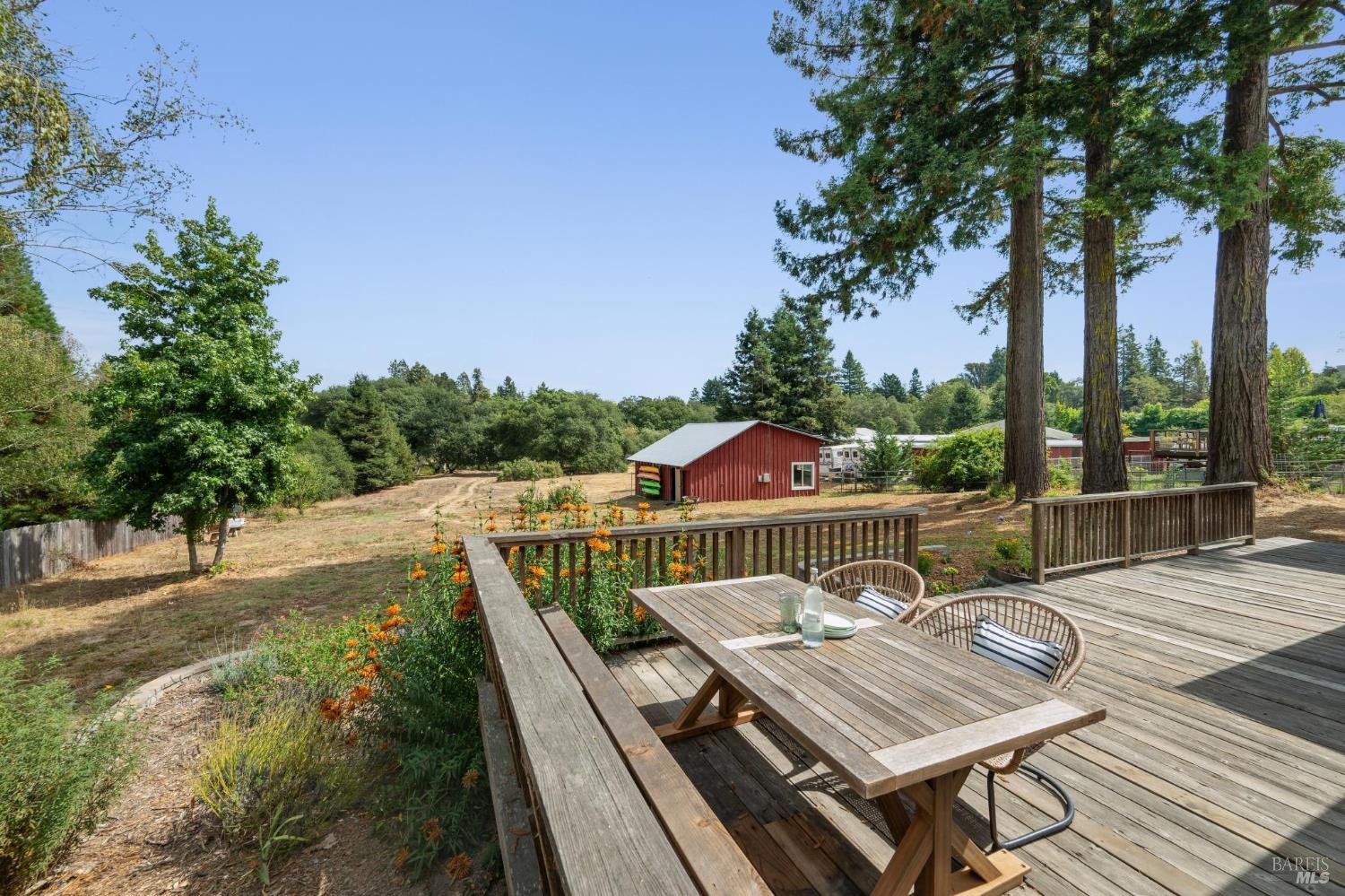 447 Sparkes Road Sebastopol, CA 95472 - Photo 30 of 44 a view of a patio with couches table and chairs and potted plants