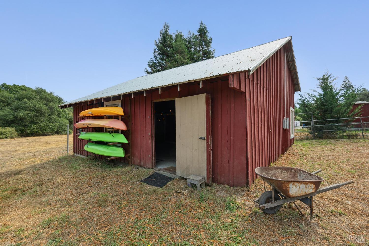447 Sparkes Road Sebastopol, CA 95472 - Photo 33 of 44 a backyard of a house with barbeque oven and yard
