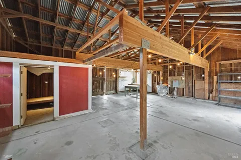 a view of a room with wooden walls