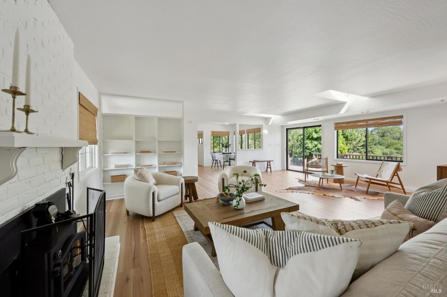 447 Sparkes Road Sebastopol, CA 95472 - Photo 7 of 44 a living room with fireplace furniture and a large window