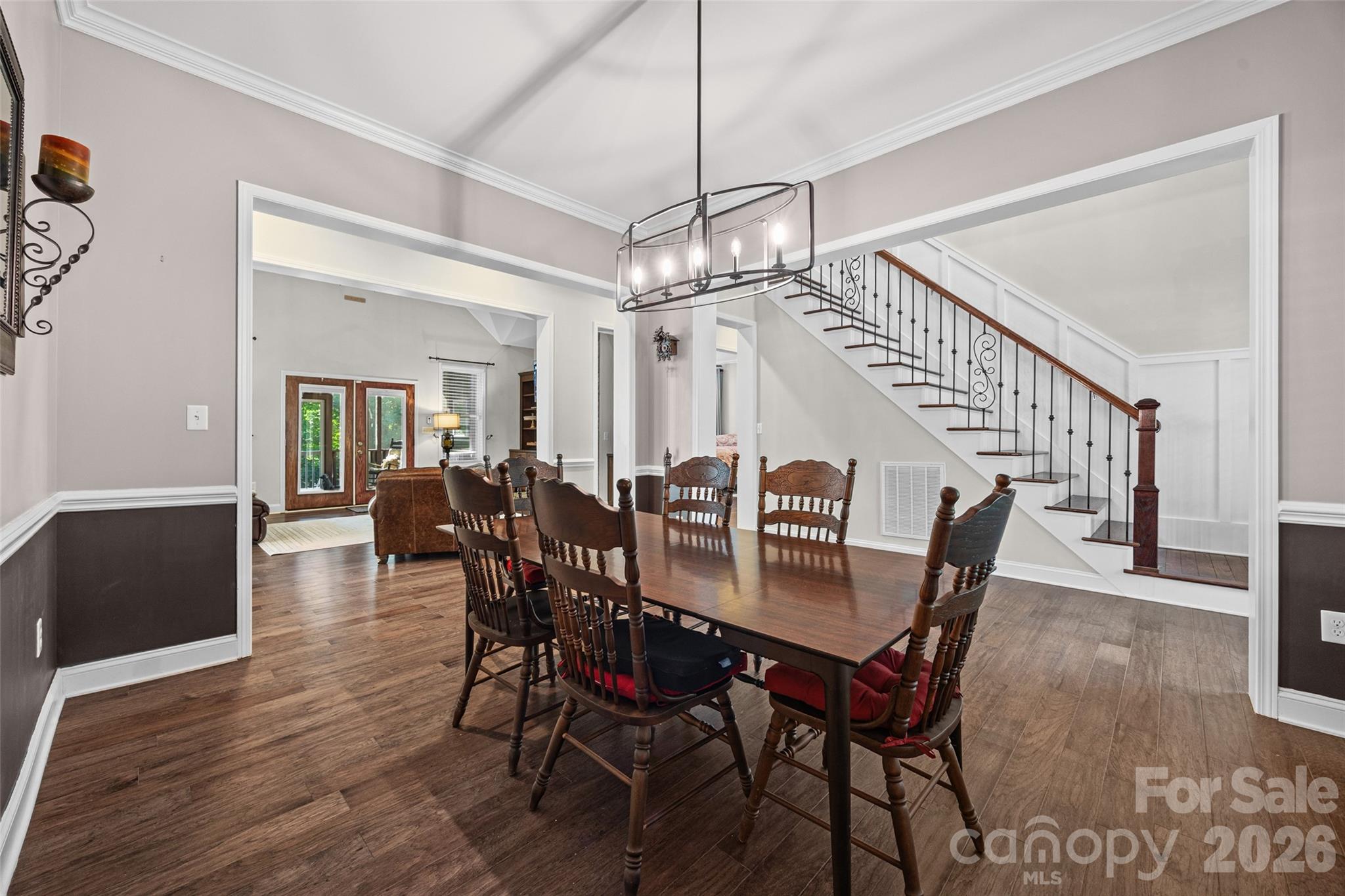 790 Brandon Road Clover, SC 29710 - Photo 8 of 43 a view of a dining room and livingroom with furniture wooden floor a chandelier