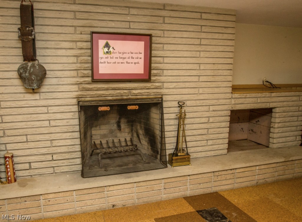 8119 Dalebrook Road Independence, OH 44131 - Photo 21 of 25 Lower Level Rec Room Fireplace