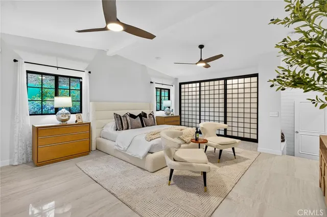 a bed room with a bed and a couch