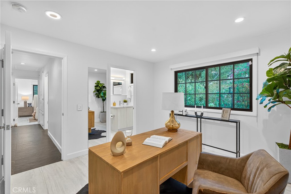 7576-7582 McGroarty Terrace Los Angeles, CA 91042 - Photo 14 of 47 a living room with furniture and a large window