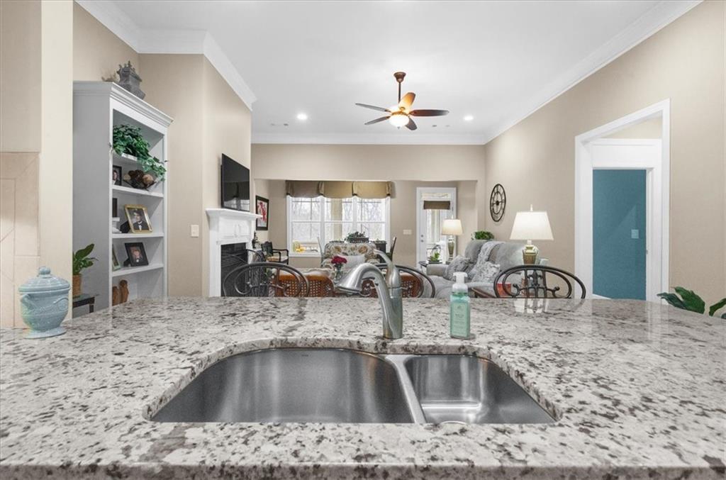3357 Locust Cove Road Gainesville, GA 30504 - Photo 15 of 77 a kitchen with kitchen island a sink stove and refrigerator