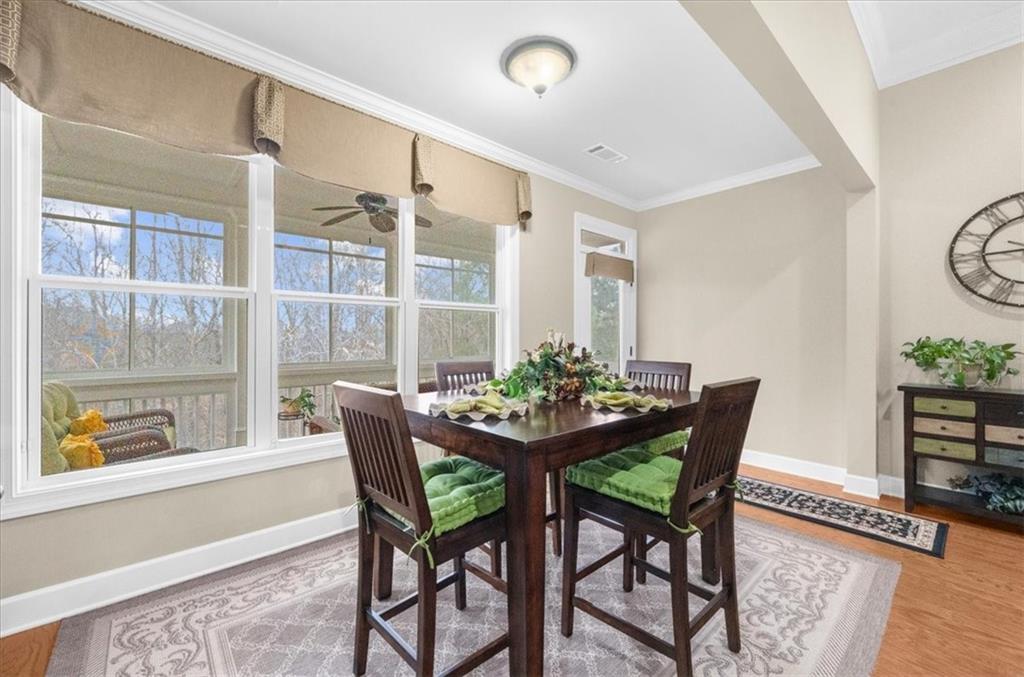 3357 Locust Cove Road Gainesville, GA 30504 - Photo 21 of 77 a dining room with furniture and window