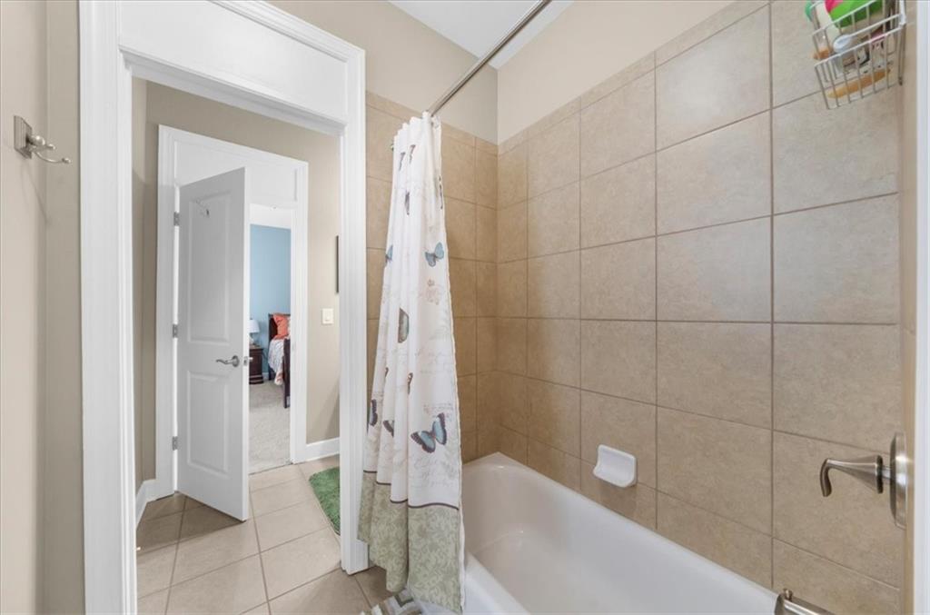 3357 Locust Cove Road Gainesville, GA 30504 - Photo 26 of 77 a bathroom with a bathtub and shower
