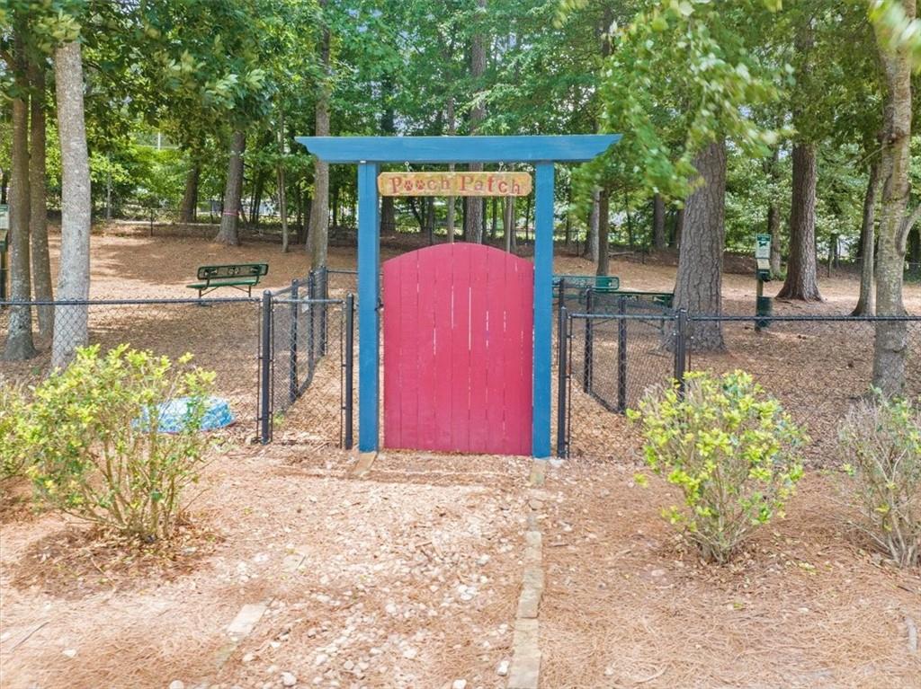 3357 Locust Cove Road Gainesville, GA 30504 - Photo 62 of 77 a front view of a house with a yard