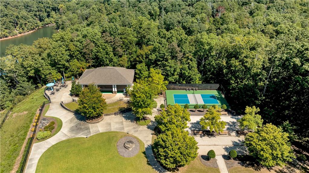 3357 Locust Cove Road Gainesville, GA 30504 - Photo 65 of 77 an aerial view of a house with swimming pool and garden