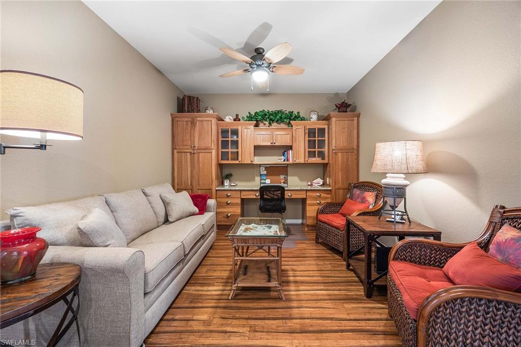 Undisclosed Address Naples, FL 34113 - Photo 16 of 38 a living room with furniture