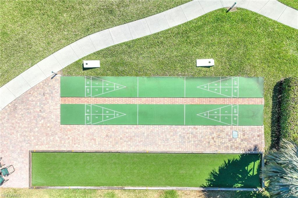 Undisclosed Address Naples, FL 34113 - Photo 36 of 38 a view of a small building with a big yard