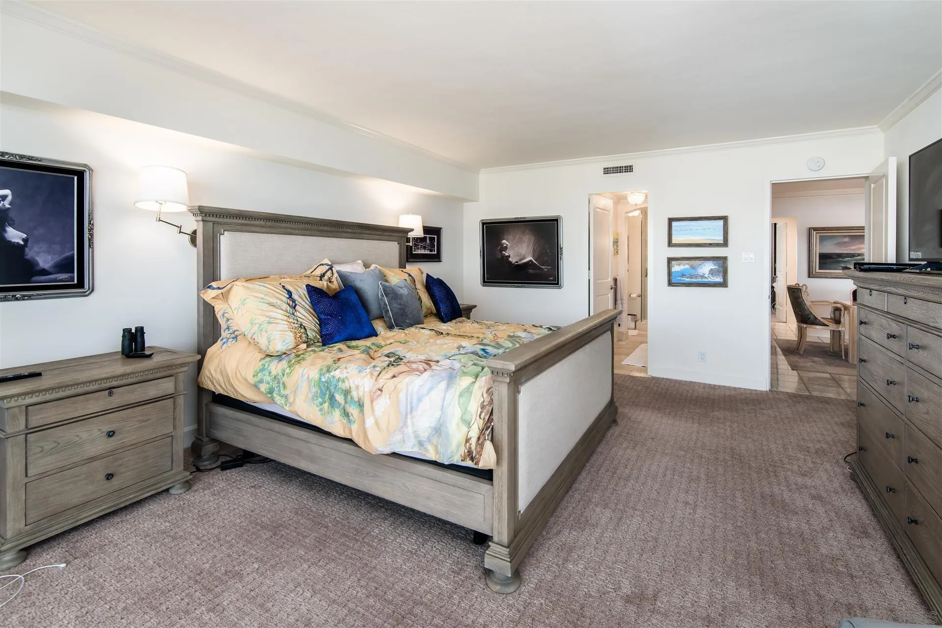 939 Coast Boulevard, Unit 16F La Jolla, CA 92037 - Photo 17 of 22 a bedroom with a bed and furniture