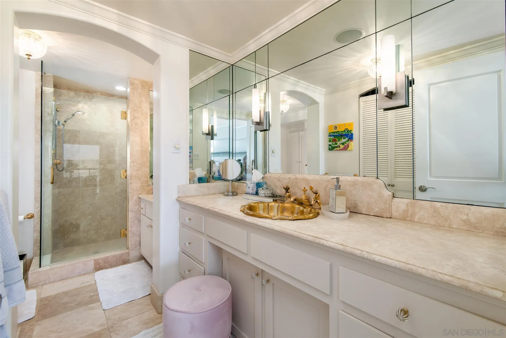 939 Coast Boulevard, Unit 16F La Jolla, CA 92037 - Photo 18 of 22 a spacious bathroom with a sink a toilet and shower