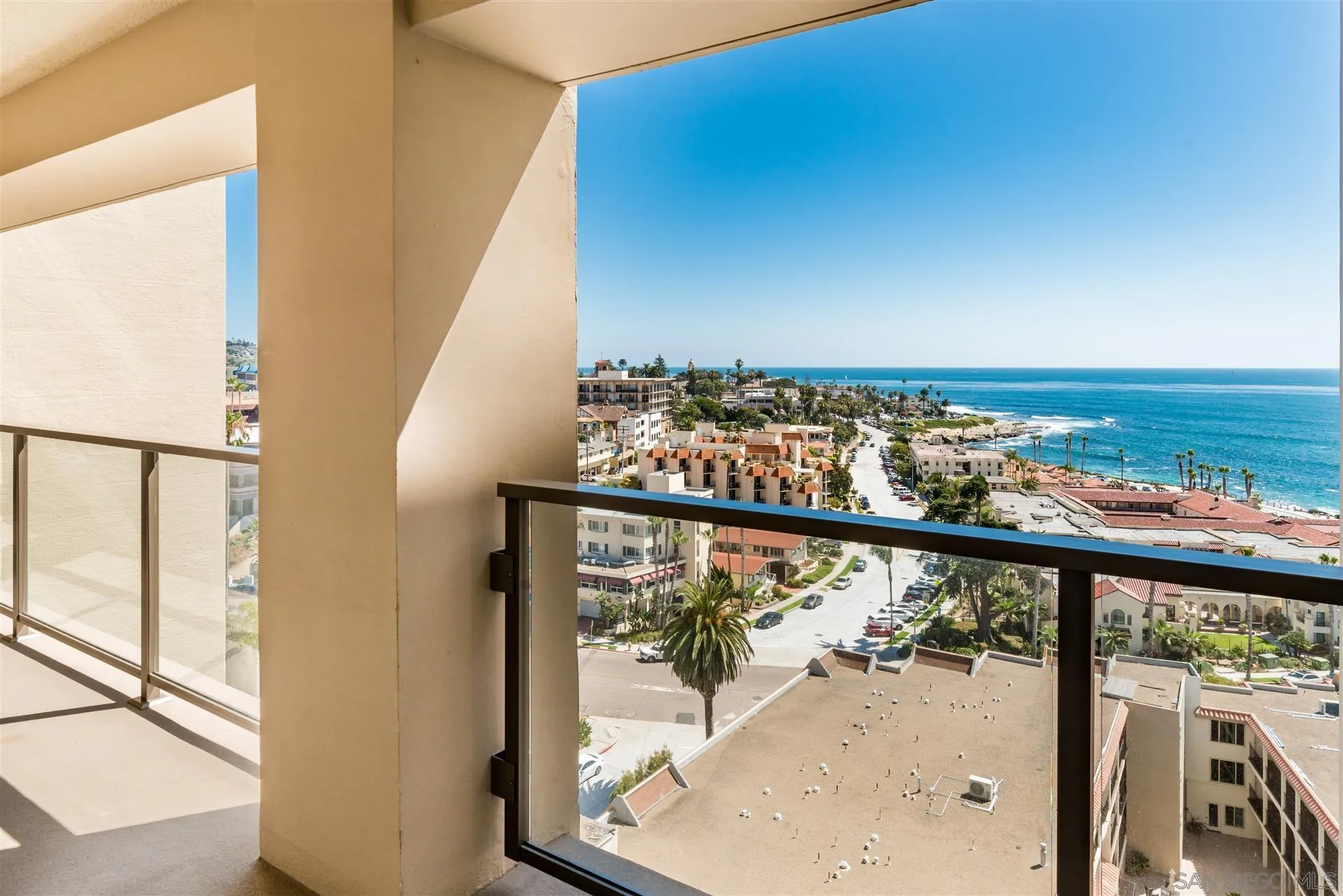 939 Coast Boulevard, Unit 16F La Jolla, CA 92037 - Photo 19 of 22 a view of a balcony with wooden floor and stairs