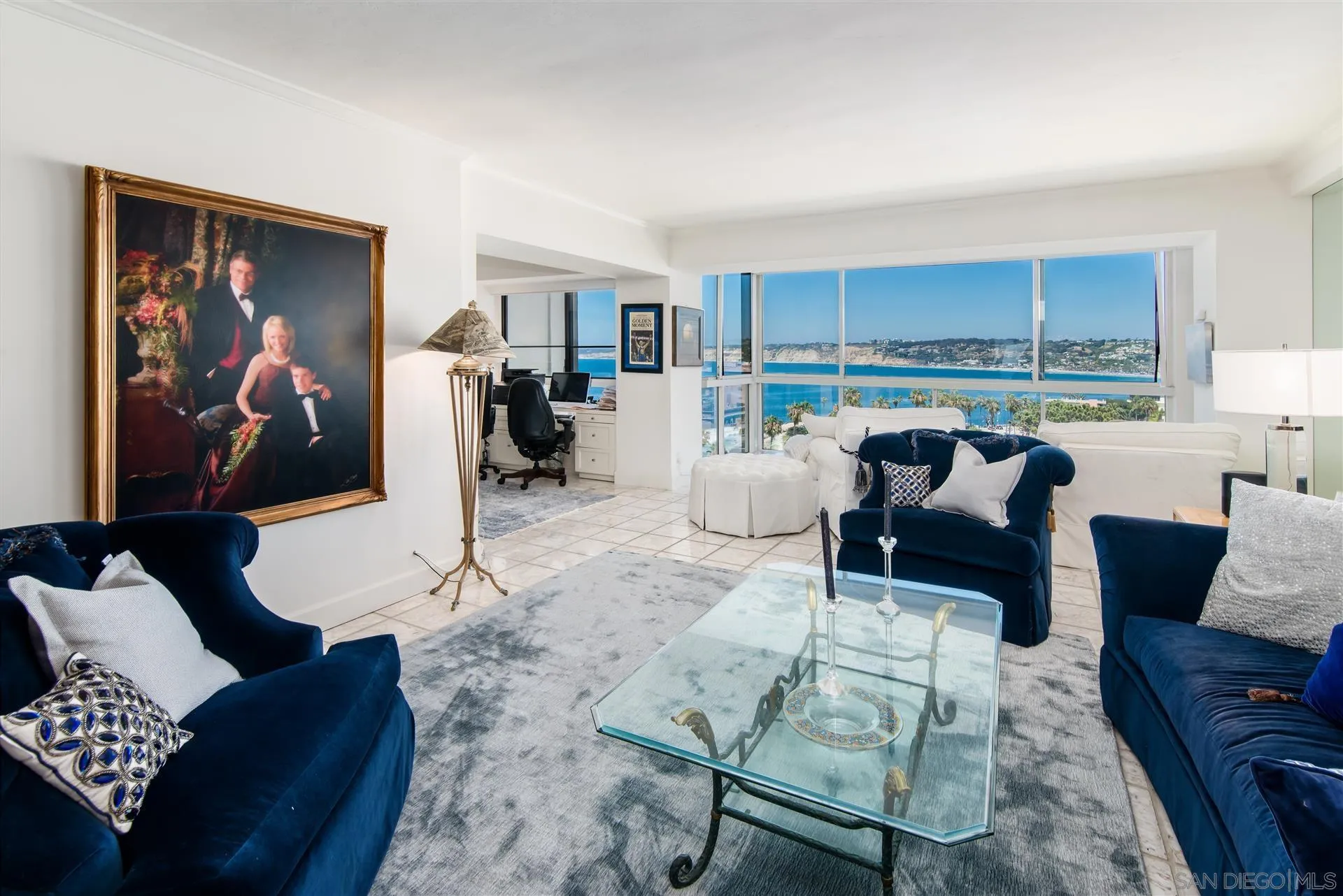 939 Coast Boulevard, Unit 16F La Jolla, CA 92037 - Photo 3 of 22 a living room with furniture and a flat screen tv